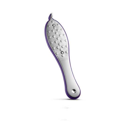 Grinding feet to remove dead skin and calluses