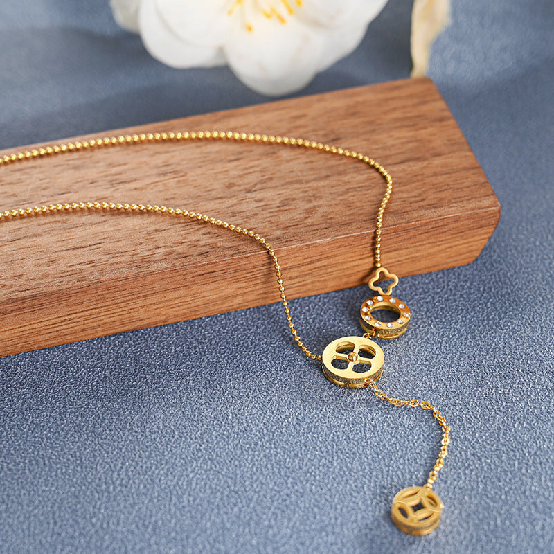 Hollow Four-leaf Clover Ring Titanium Steel Necklace